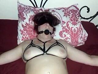 tied to bed blindfolded, this british milf waits for stranger with ring gag and choking spread