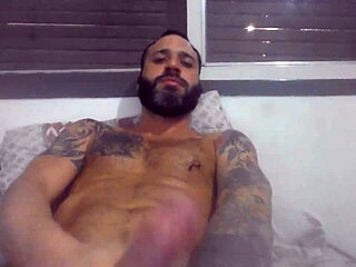 jerking off till bursting with pierced nipples and tattoos