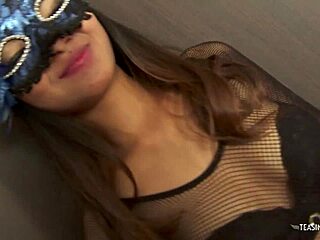 The mask hides her face so the Asian girl feels every intense thrust deeply