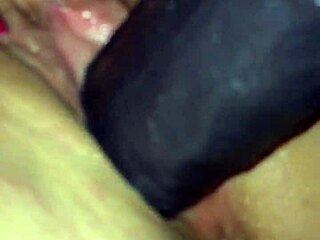 Wife takes on big black cock by fucking herself wet until squirting everywhere