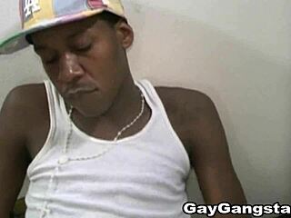 Black gay man masturbates his young ebony cock with nasty handjob in ghetto setting