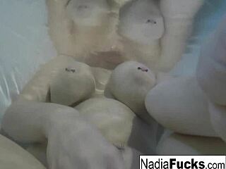 Sexy nadia takes a bath with some rubber duckies