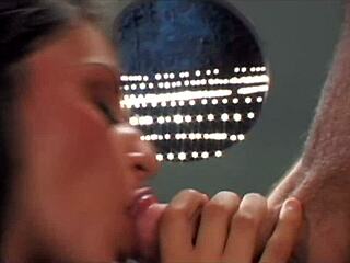 Feeling intense pleasure, brunette ignores agent while getting anal fucked and cum in mouth.