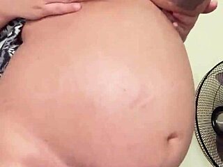 Horny pregnant maid shows big boobs and hairy pussy on camera alone