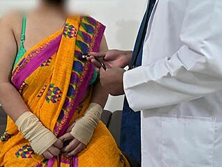 The doctor is checking the telugu aunty's boobs in the hospital with the nurse watching this indian patient scene.