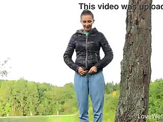 susie performs outdoor pissing scene in public