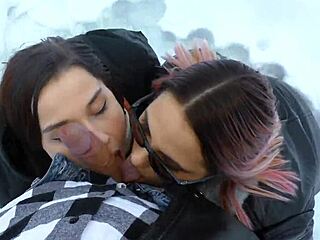 These two hot girls are warming my cock in the snow.