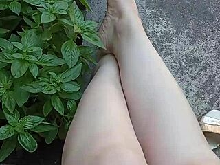 Gretala boldly airs her pussy in the courtyard.