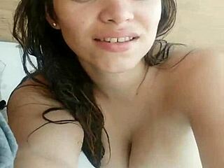 Lili shares a casual webcam moment with a latina friend