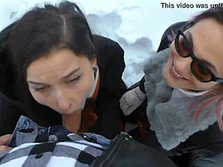 These two hot girls are warming my cock in the snow.