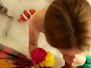 a beautiful milf invited me to the bathroom, took my cock in her hand, and started sucking