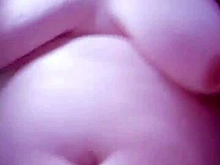 In this whatsapp sex video, a woman strips to underwear for a steamy camshot with big tits and monster cock