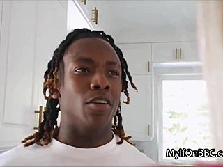 Housewife uses filthy mouth to harden big black cock