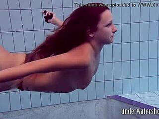 Lucy strips off bikini in pool underwater