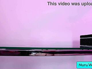 Busty Teen Brunette Applies Wet Nuru Gel for Sensual Massage