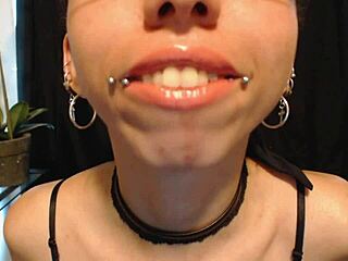 putting on nude colored lipstick and drooling all over it