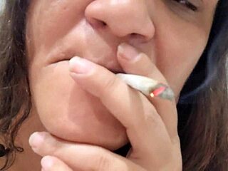 Latina Amateur Smokes Tobacco While Cumming On It