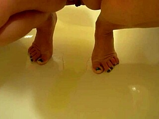 Milf caresses her anal then shows her pussy from the inside and pisses