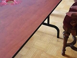 she stomps cum out of his huge cock on the desk