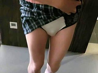 Flirting in front of the mirror with a ladyboy