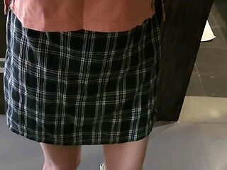 Flirting in front of the mirror with a ladyboy