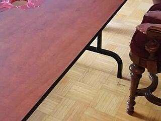 she stomps cum out of his huge cock on the desk