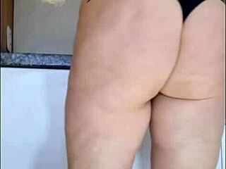 Hidden camera catches stepmother in kitchen in just panties and see-through blouse