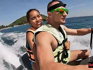 Asian girlfriend gives a blowjob in public on a jetski