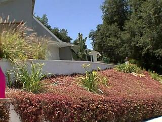 Japanese girl with big tits engages in bedroom activities.