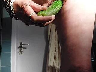 German granny intensely fucks pussy with cucumber