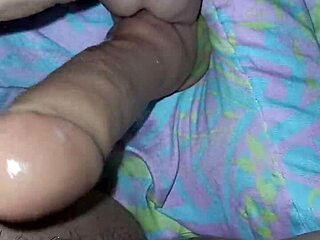 Putita Suggestively Inserts Dildo into Wet Pussy
