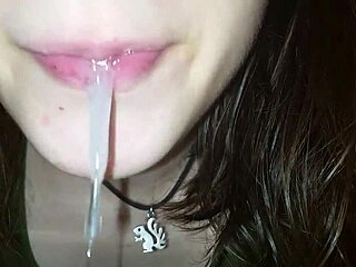 A woman demonstrates spitting in high definition