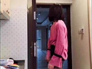 Asian ladyboy strokes her hard cock teasing a woman before explosive cum reveal