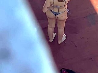 Argentinian neighbors sunbathe in bikinis on terrace part 4