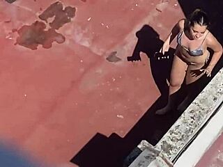 Argentinian neighbors sunbathe in bikinis on terrace part 4