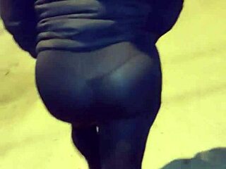 mature curvy exhibitionist flashes huge ass in see-through leggings on public street taboo tease