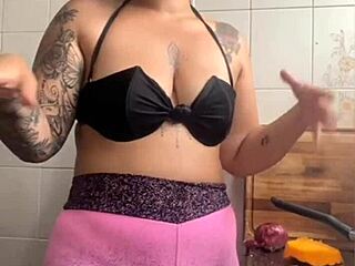 making dinner for hubby's friend knowing i'll be their halloween dessert in the kitchen 👻🍑