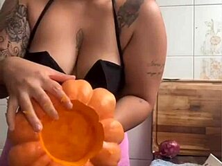 making dinner for hubby's friend knowing i'll be their halloween dessert in the kitchen 👻🍑