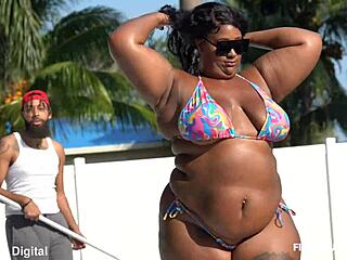 Curvy ebony beauty mounts new pool boy riding his huge black cock poolside