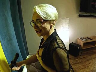 hey, check out this horny mature blonde in glasses working her big ass with a dildo solo stockings close-up