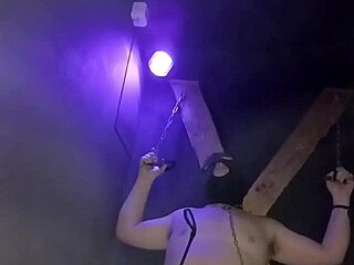 bound housewife kantalis chained in club cage for bdsm humiliation