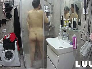 Luuv Alice tattoos flash shaved pussy and natural tits showering with boyfriend voyeur