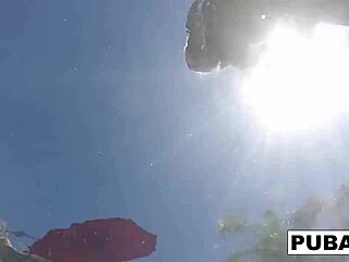 Olivia strips nude by the pool, fingers her big tits and pussy solo