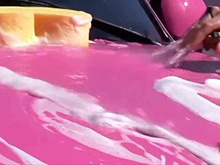 Blonde lesbos wash car seductively before outdoor strapon threesome