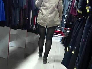 a hidden cam catches juicy pawg legs in nylons at mall fitting room voyeur peek