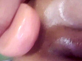 curious shemale teases with her huge toy up close