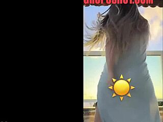 hot blonde dances seductively in sheer see-through dress