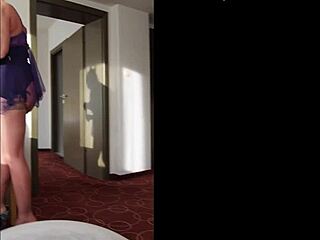 lady mona poses nude in tulle mini dress corset stockings heels