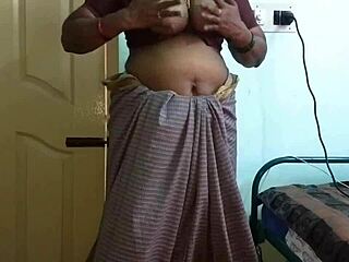 Horny desi wife vanitha in grey saree squeezes huge boobs rubs shaved pussy desperately