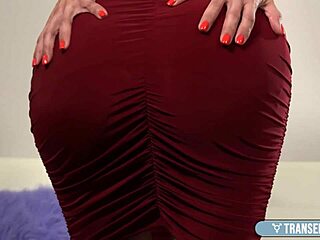 A shy latina ts foxxy slips off red lingerie to stroke her cock solo